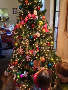 Tree trimming - why are all the ornaments on the bottom half?